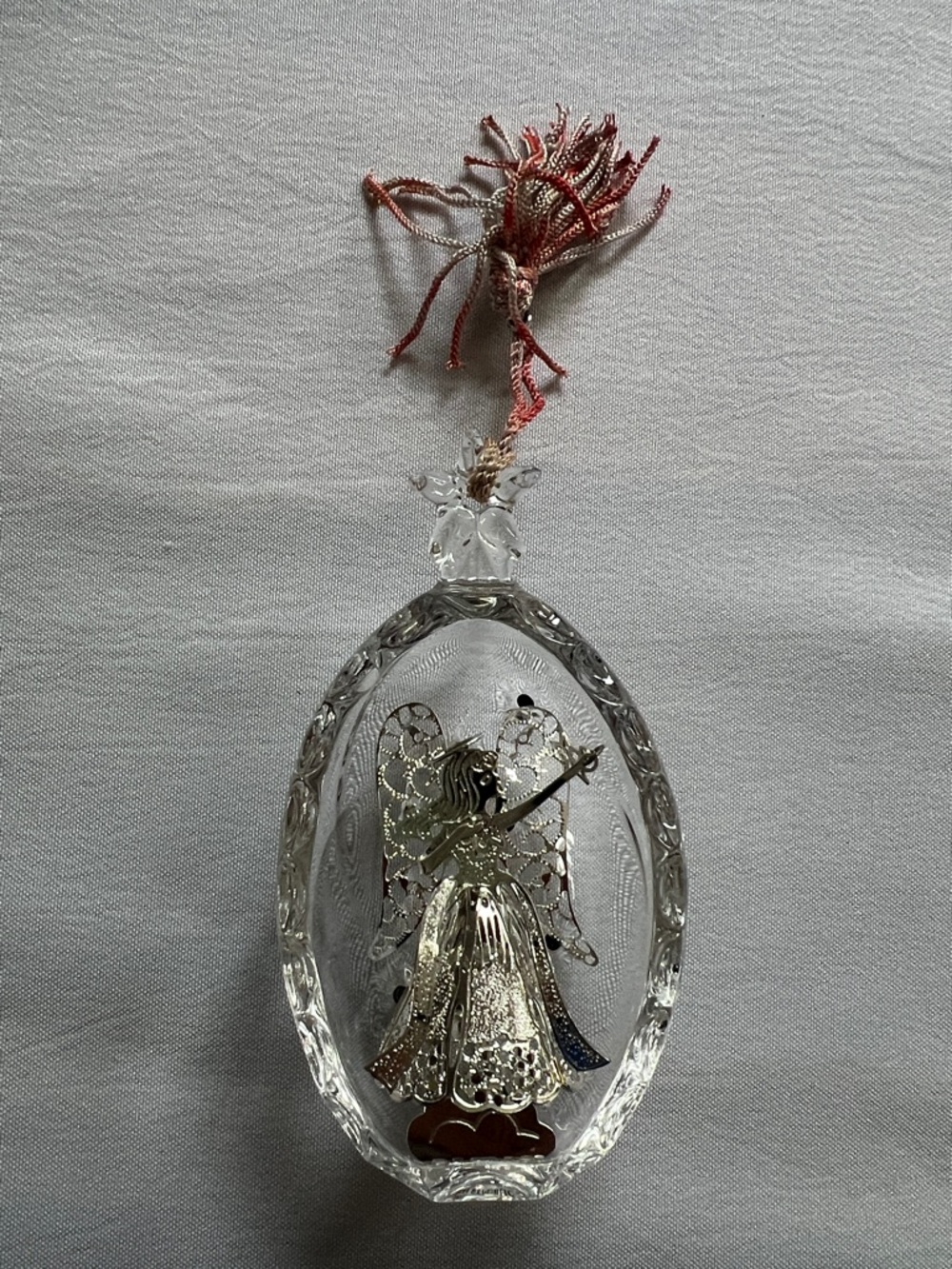Lenox Clear Glass Ornament with Silver Angel and Red Tassel